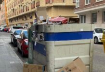 Contenedor de basura en Palencia a día de 11 de septiembre